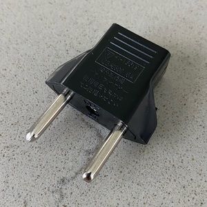 FREE International Outlet Adapter (for Travel)